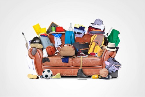 Homeowner assessing loft space for clearance